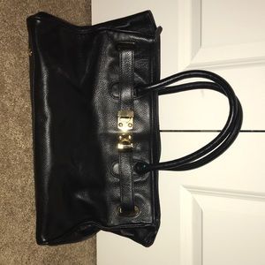 Black leather Onna Ehrlich handbag.